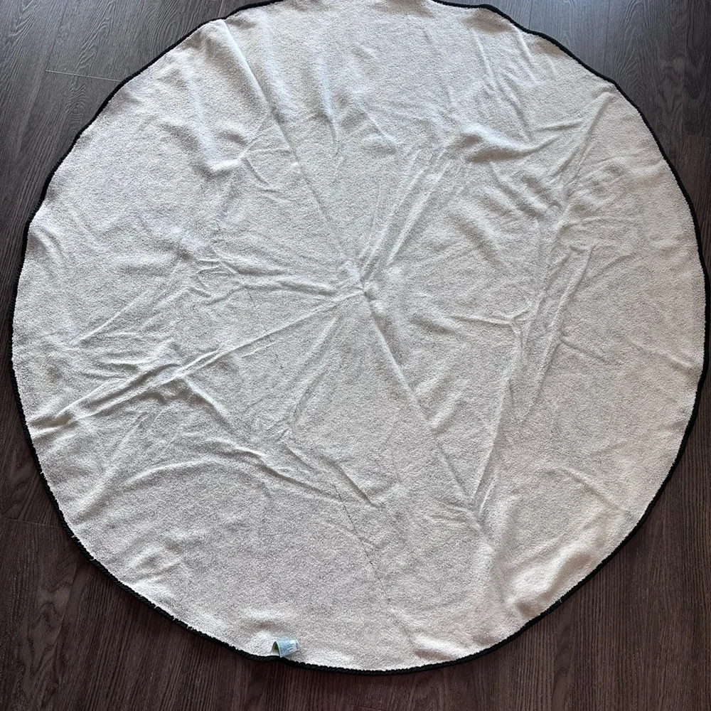 Round Blue Mandala Beach Towel in blue and black print